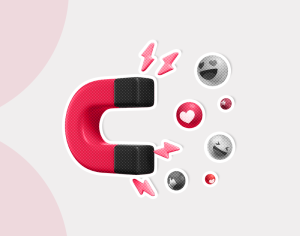 A red magnet with black poles emits pink lightning, attracting various emoji, including smiling, heart, and thumbs-up symbols on a light background.