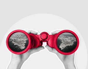 Hands hold up red binoculars showing aerial views of a coastal landscape in each lens, creating a sense of exploration and discovery against a grey background.