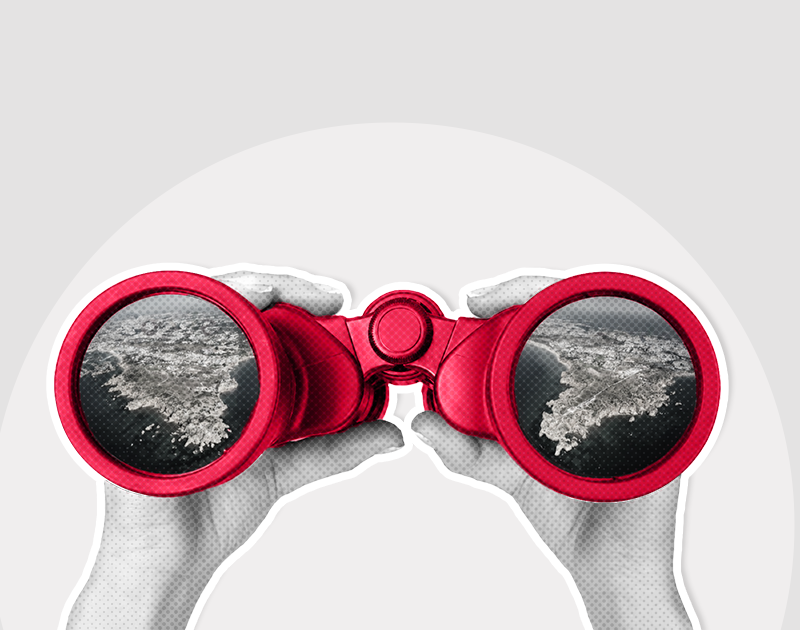 Hands hold up red binoculars showing aerial views of a coastal landscape in each lens, creating a sense of exploration and discovery against a grey background.