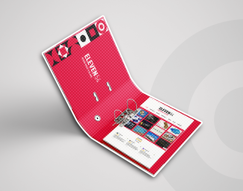 A red folder displaying a graphics prominently on its surface.